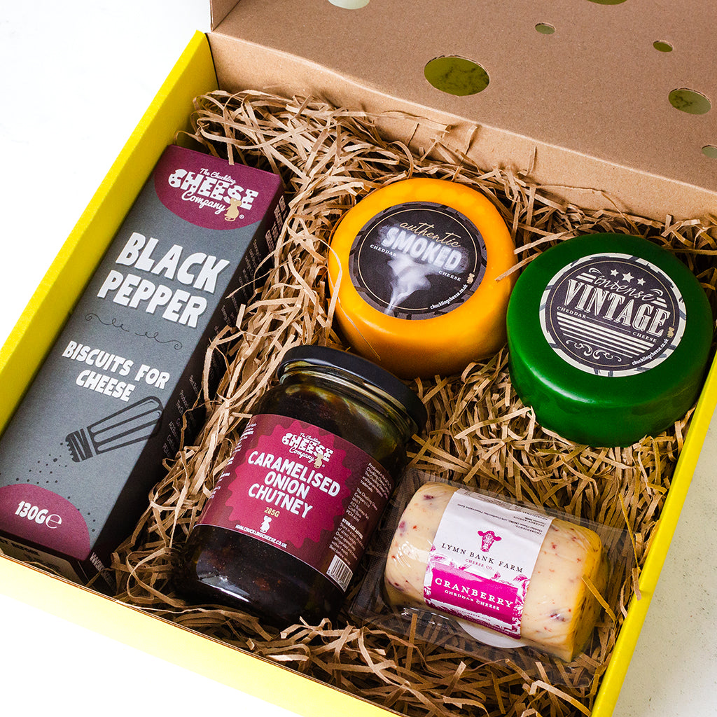 Chuckling Cheese Classic Cheeseboard Selection Box with cheese truckles, cranberry cheddar barrel, chutney, crackers and gift box packaging