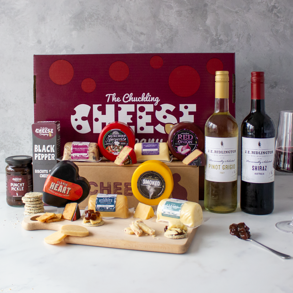 Chuckling Cheese cheese truckle hamper with wine bottles, chutneys, biscuits and assorted cheddar truckles