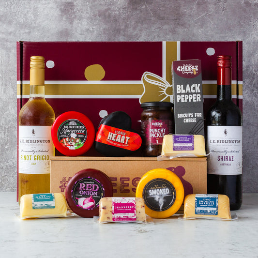 Chuckling Cheese luxury wine and cheese hamper with truckles, mini cheeses, Punchy Pickle, Black Pepper biscuits and gift box