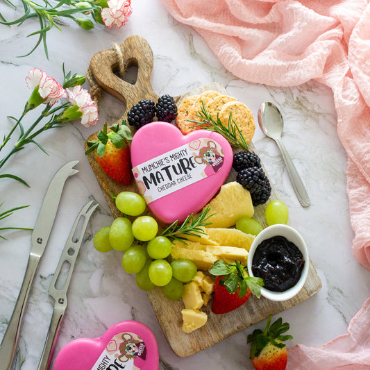 Chuckling Cheese Mother’s Day cheeseboard with heart-shaped mature cheddar, fruit and crackers