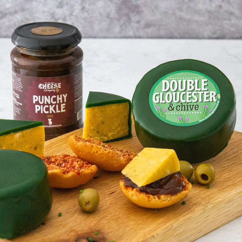 Chuckling Cheese Double Gloucester & Chive Cheddar with Punchy Pickle, crackers and sliced cheese