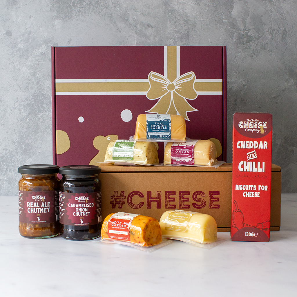 Chuckling Cheese gourmet gift basket with cheese barrels, chutneys and Cheddar Chilli biscuits