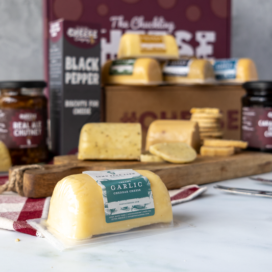Luxury cheese hamper with British cheeses, crackers, chutneys and gift boxes