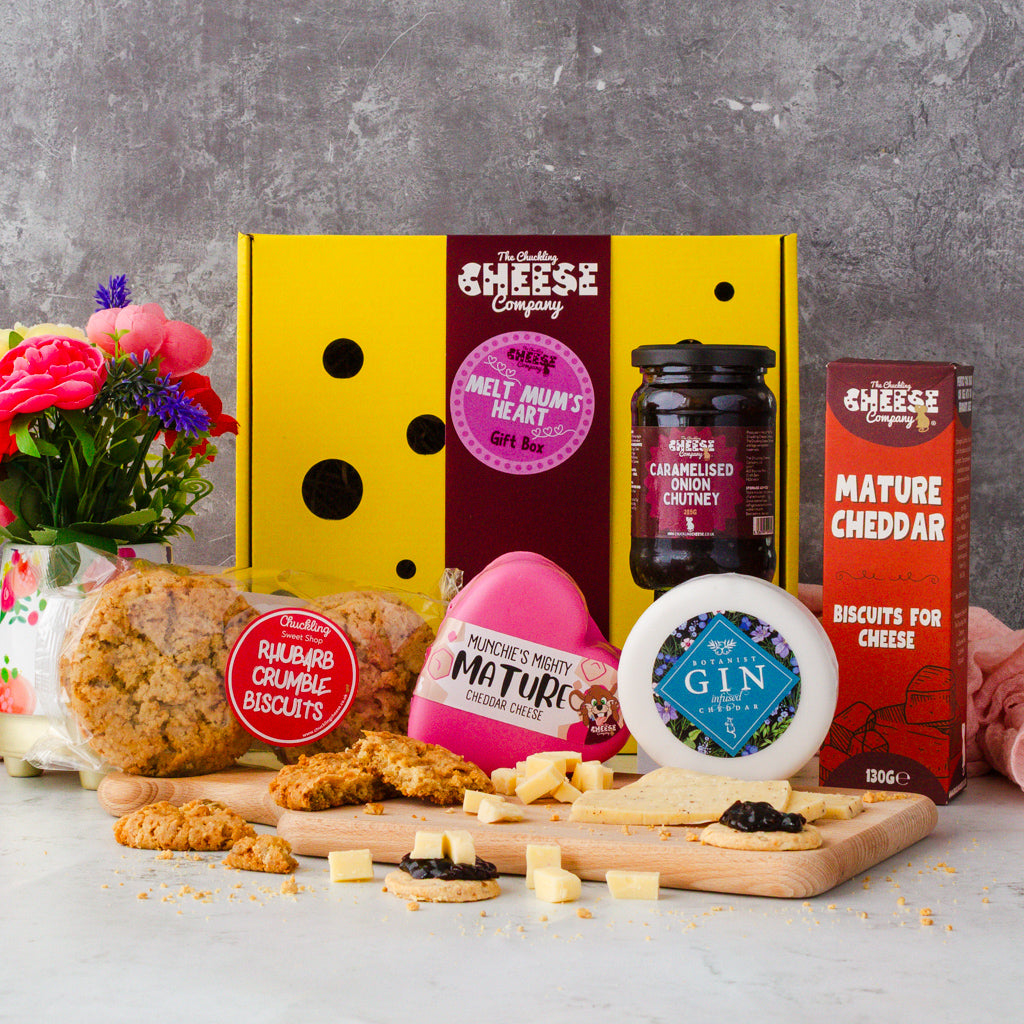 Chuckling Cheese Melt Mum’s Heart gift box with pink heart cheddar, Botanist Gin cheese, biscuits, chutney, cookies and flowers