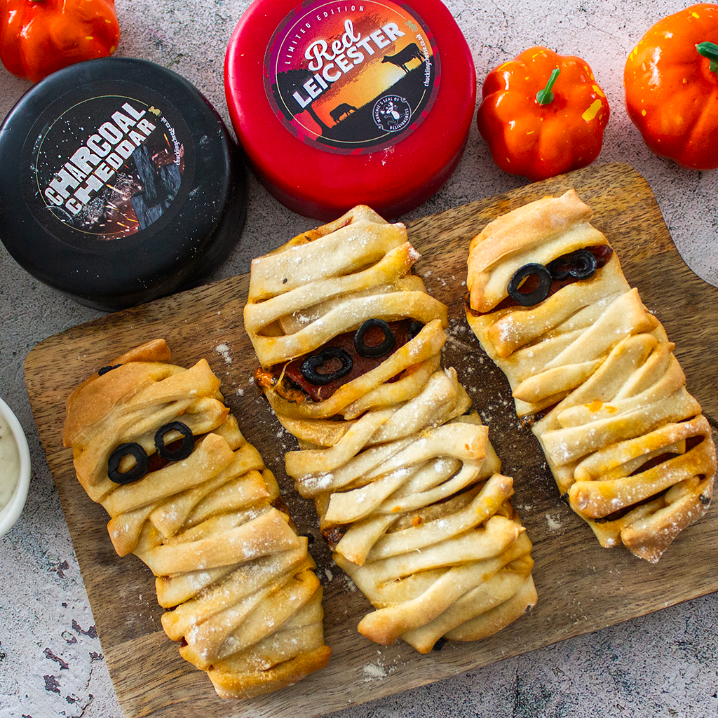 Halloween mummy pastries with Chuckling Cheese truckles, pumpkins and spooky cheeseboard ingredients