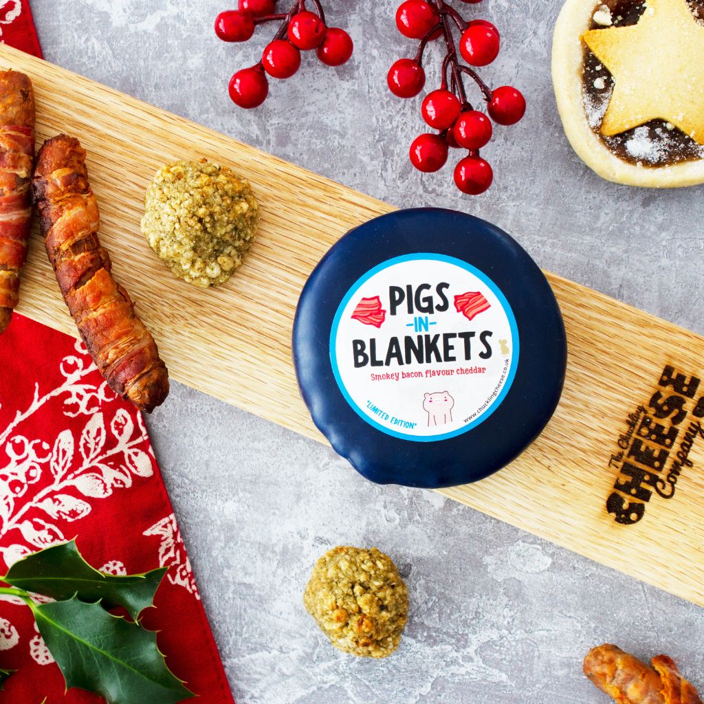 Chuckling Cheese Pigs in Blankets cheddar with festive sausages, cranberries and cheese board accompaniments