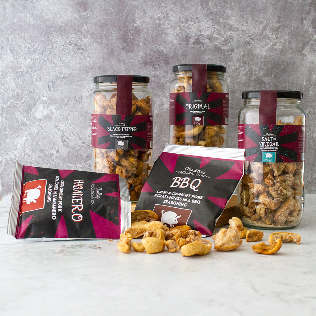 Chuckling Cheese pork scratchings gift selection with jars, snack bags and crunchy pieces