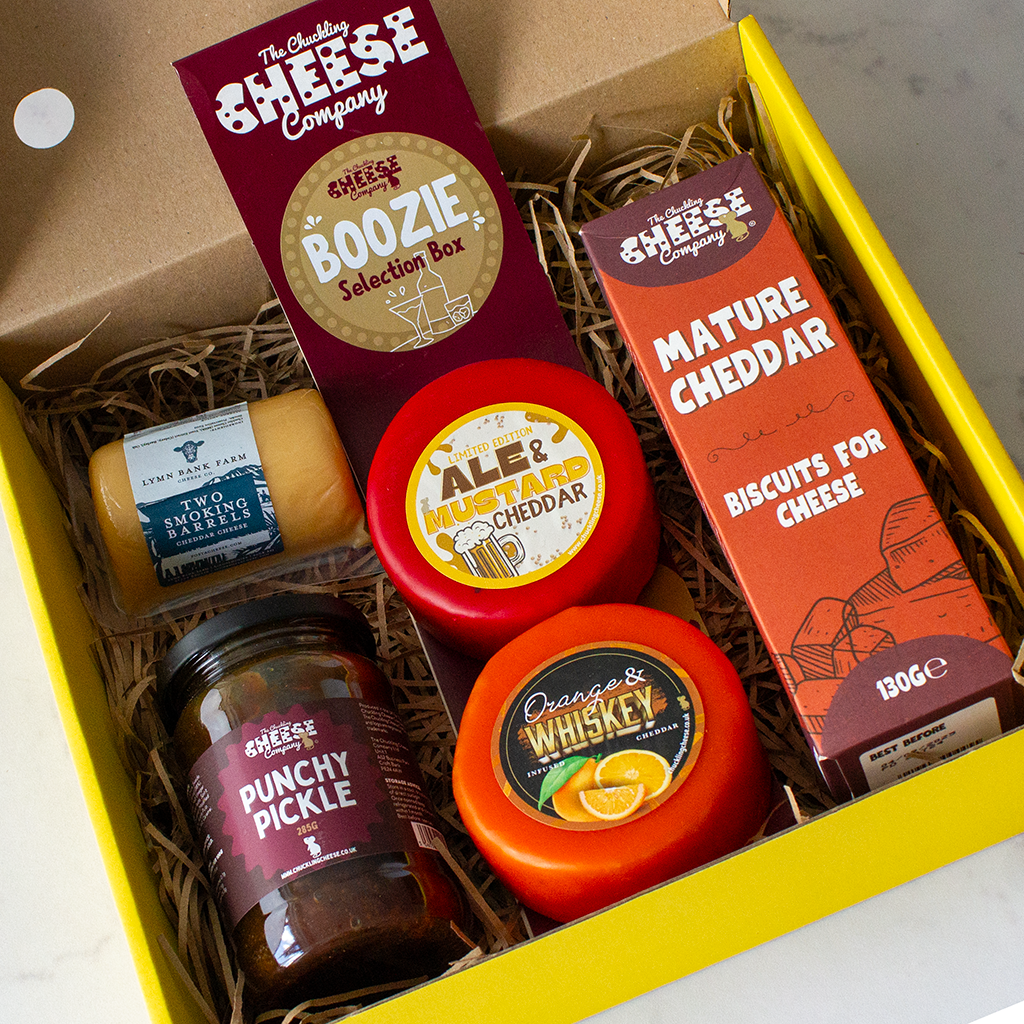 Chuckling Cheese Boozie Selection Box with Ale & Mustard Cheddar, Orange & Whiskey Cheddar, Punchy Pickle, biscuits and mini cheese