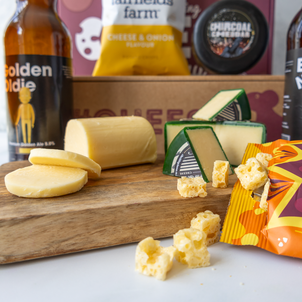 Chuckling Cheese tasting hamper with Vintage Cheddar, Charcoal Cheddar, Golden Oldie beer, cheese bites, crisps and gift box