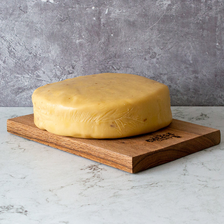 Cheese Wheels & Large Cutting Cheeses - Chuckling Cheese – The ...