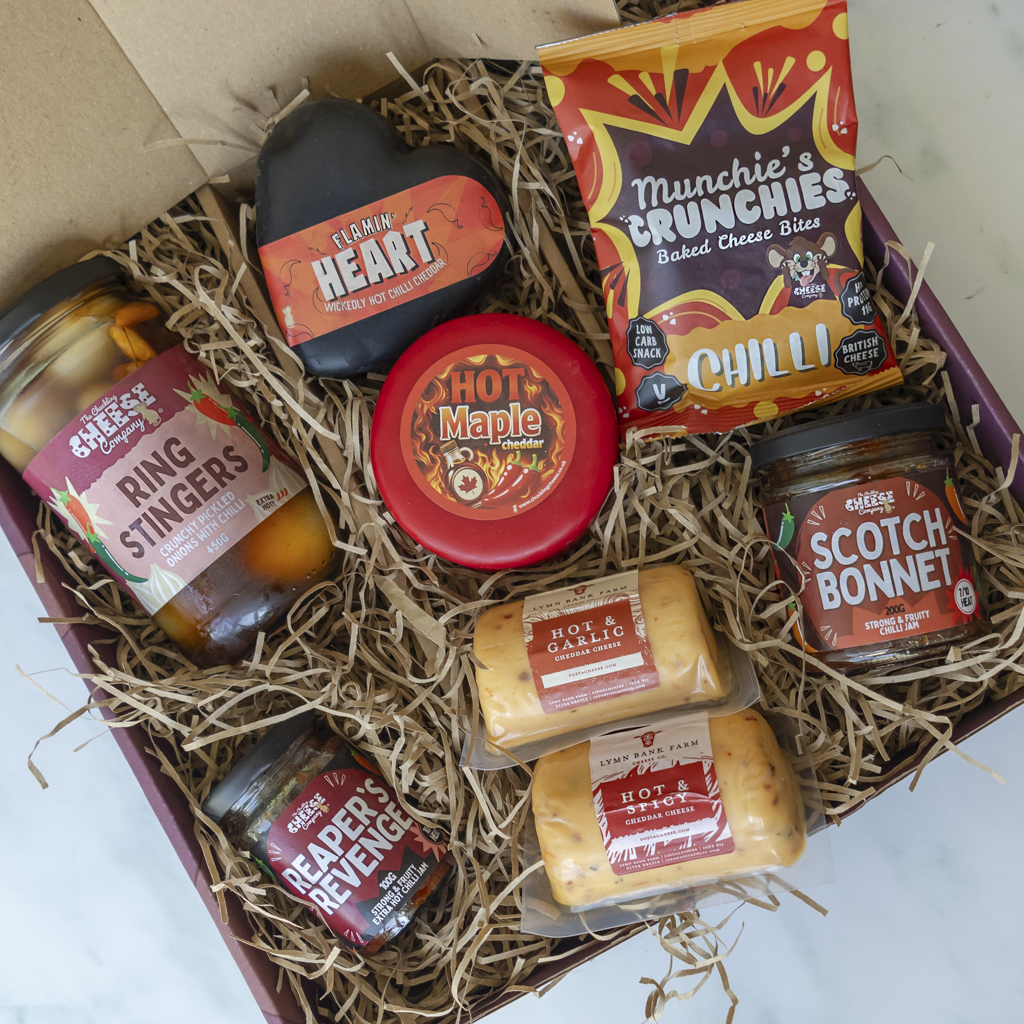 Open All About The Burn Hamper packed with chilli cheeses, jams and pickled onions