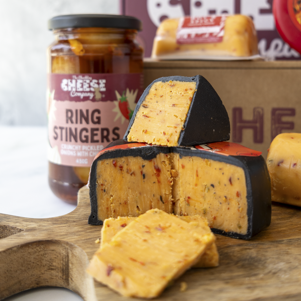 Sliced Flamin’ Heart Cheddar with Ring Stingers pickled onions from spicy hamper