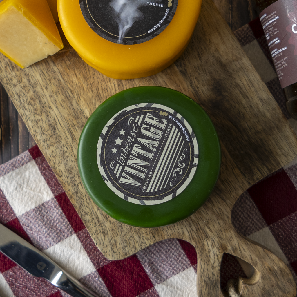 Intense Vintage Cheddar with Authentic Smoked Cheddar and cheeseboard accompaniments.