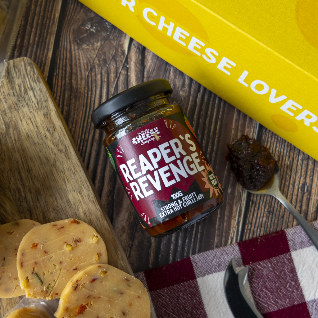Reaper’s Revenge extra hot chilli chutney with crackers and spicy cheese gift box products.