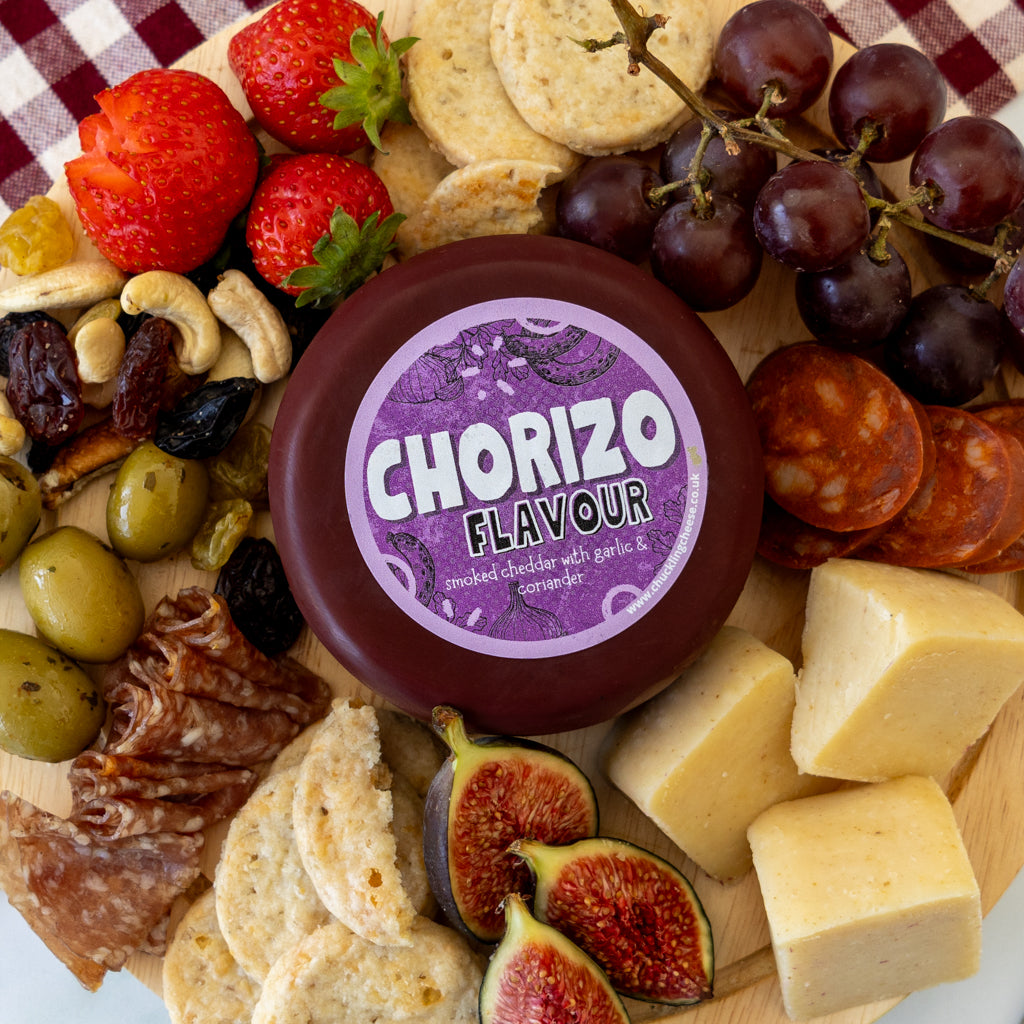 Chuckling Cheese Chorizo Cheddar Truckle platter with crackers, grapes, figs and savoury accompaniments
