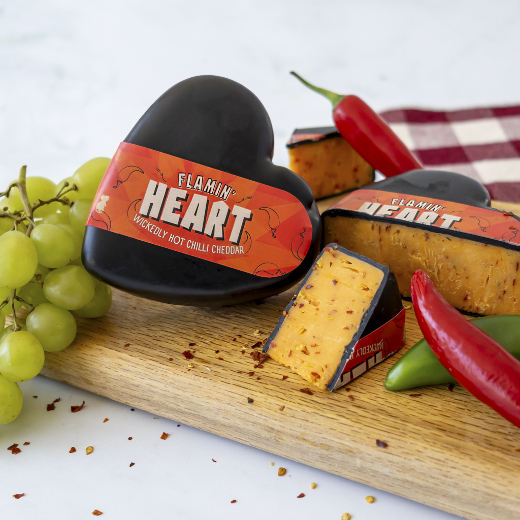 Chuckling Cheese Flamin' Heart Hot & Spicy Cheddar Truckle with chilli and grapes