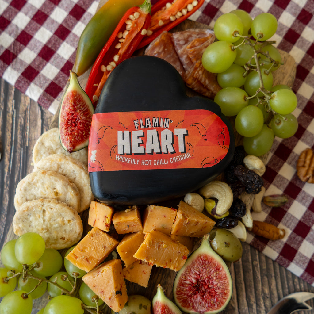 Chuckling Cheese Flamin’ Heart hot chilli cheddar with grapes, figs, crackers, chillies and cheese cubes