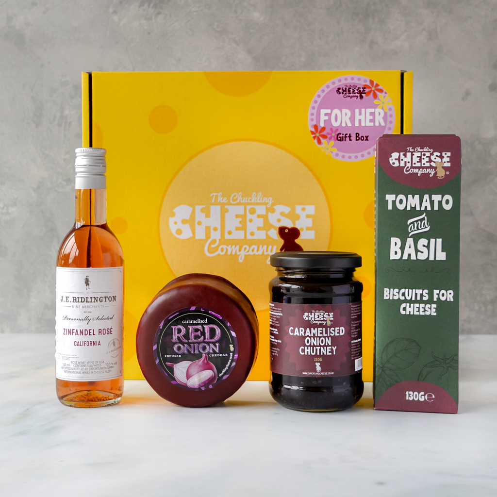 For Her cheese gift box with Caramelised Red Onion Cheddar, Zinfandel Rosé, caramelised onion chutney and tomato & basil biscuits for cheese.