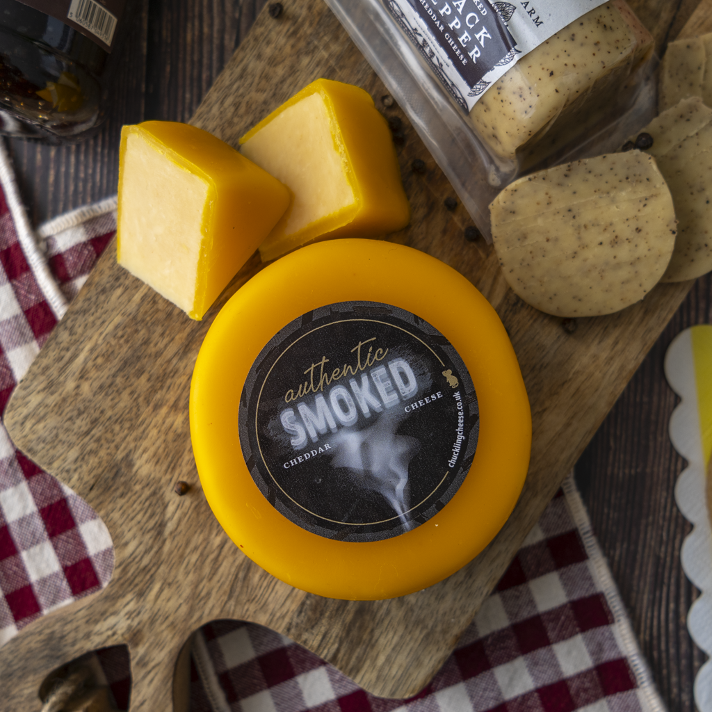 Authentic Smoked Cheddar with cheese cubes, crackers and Grandad’s gift box accompaniments.
