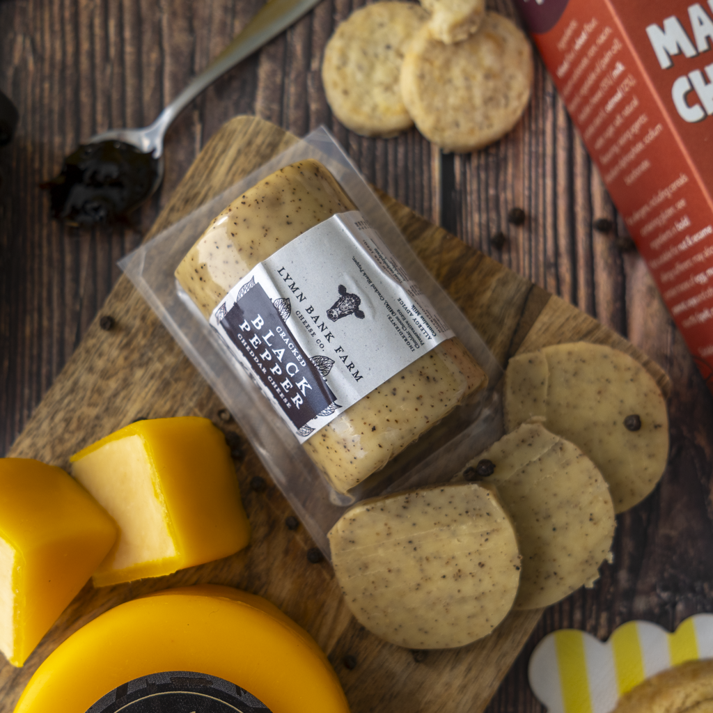 Black Pepper Cheddar with crackers, cheese cubes and other Grandad’s gift box treats.