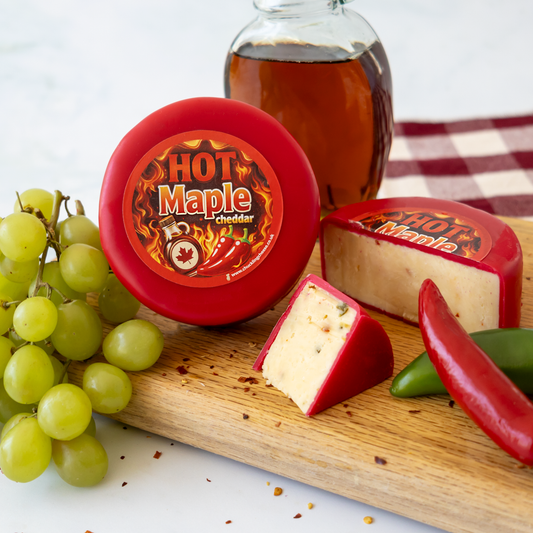 Hot Maple Cheddar Truckle with grapes, maple syrup, chilli and cheese wedges