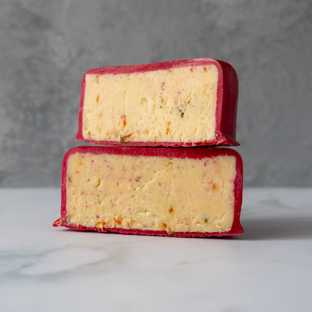 Close up of sliced Hot Maple Cheddar with maple and chilli flavour