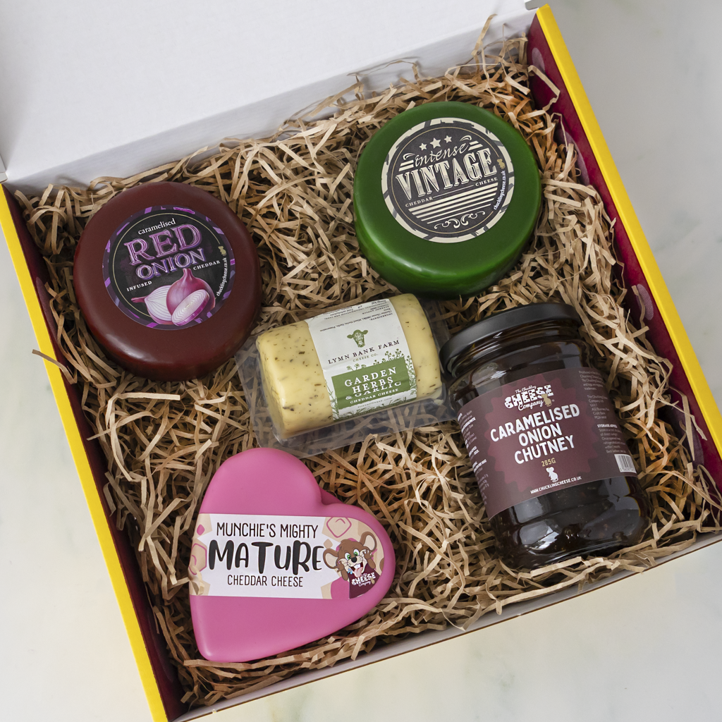 Lincolnshire Gift Pack with Caramelised Red Onion Cheddar, Intense Vintage Cheddar, Garden Herbs & Garlic Cheddar, Mature Cheddar and caramelised onion chutney.