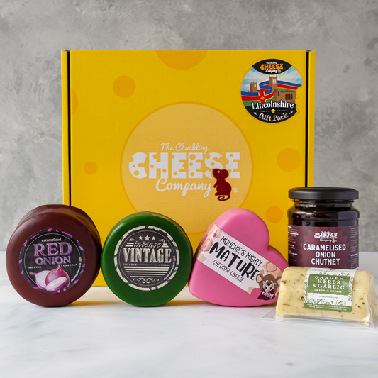 Lincolnshire Gift Pack with Caramelised Red Onion Cheddar, Intense Vintage Cheddar, Mature Cheddar, Garden Herbs & Garlic Cheddar and caramelised onion chutney.