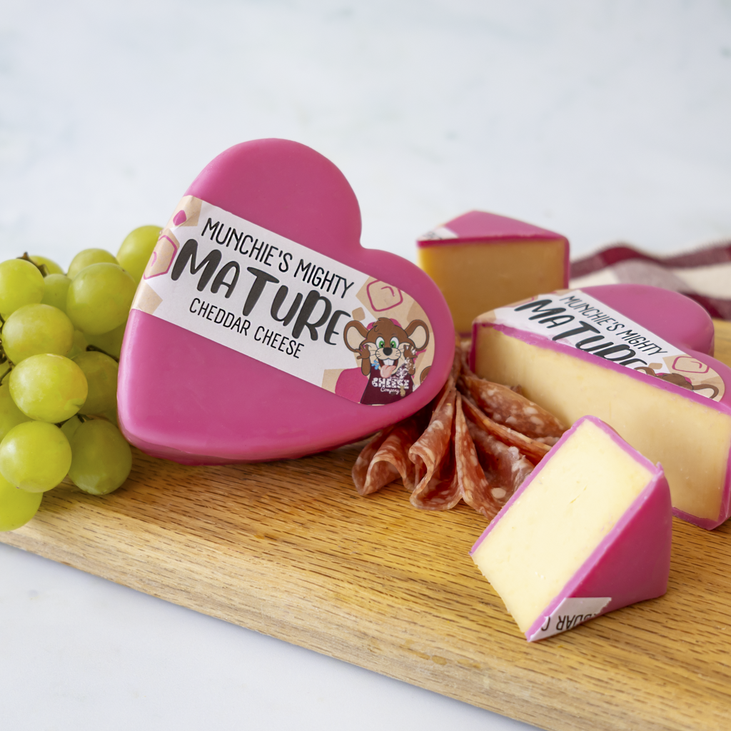 Chuckling Cheese Munchies Mighty Mature Heart Cheddar Truckle with grapes and cheese wedges