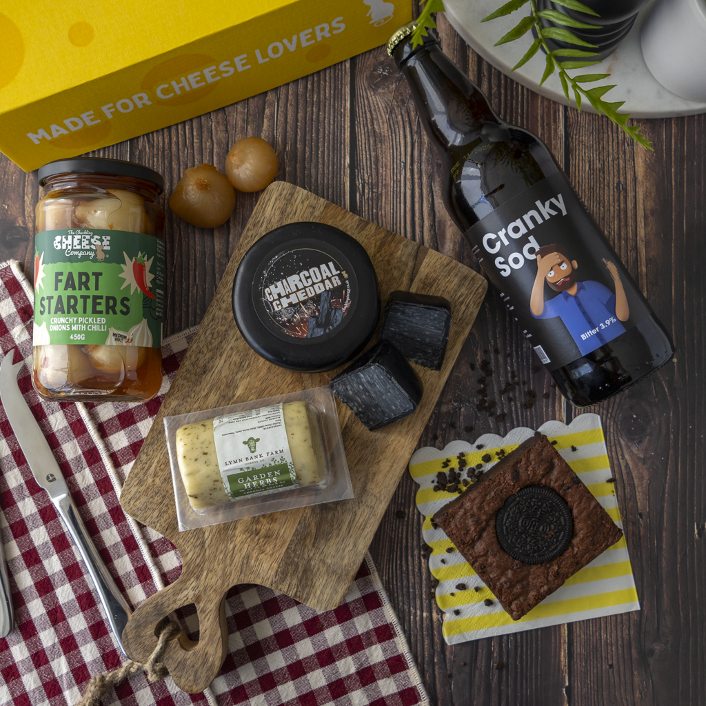 Mr Grumpy Gift Box with Charcoal Cheddar, Garden Herbs Cheddar, Fart Starters pickled onions, Cranky Sod bitter and a brownie treat.
