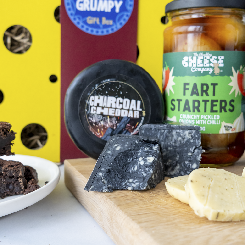 Mr Grumpy Cheese & Beer Gift Box close up with Charcoal Cheese Truckle and Cranky Sod Beer