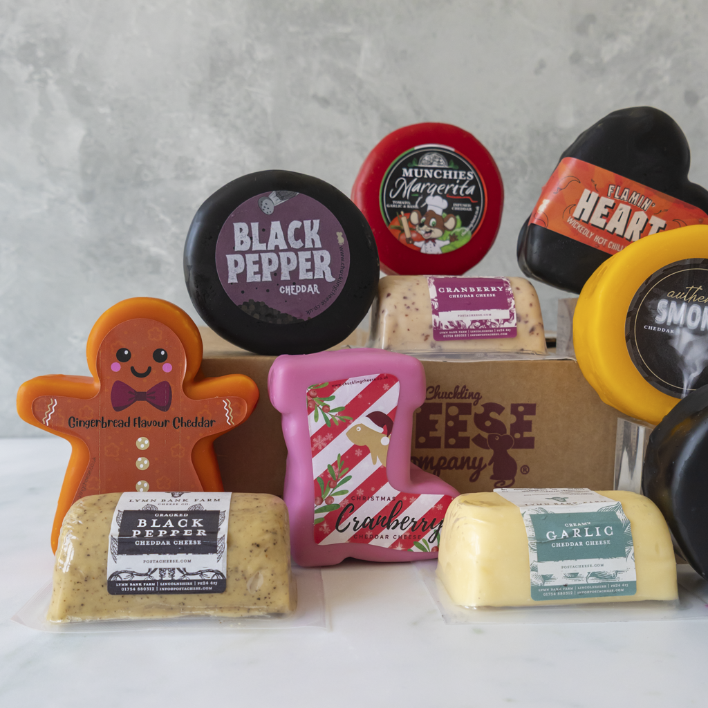 Mystery Box foodie gift selection with cheese truckles, sweets and artisan treats