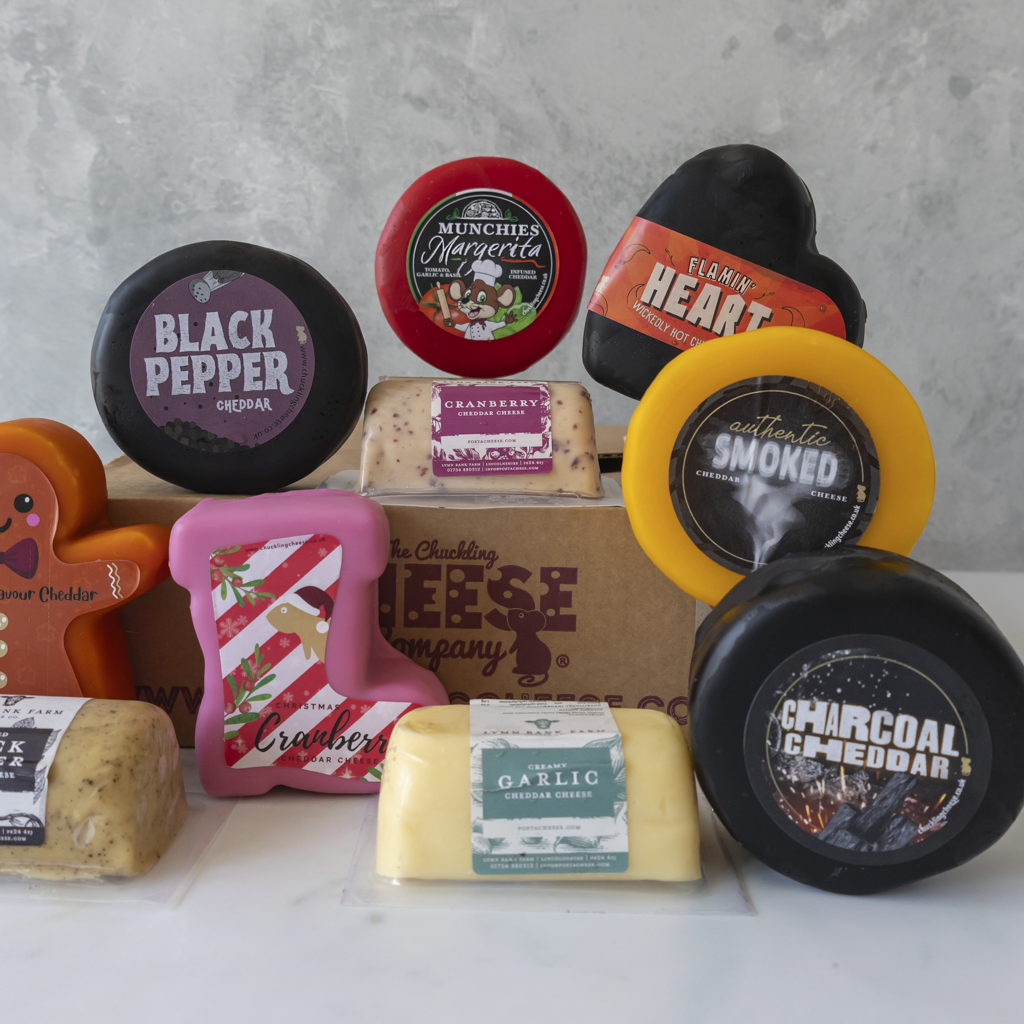 Chuckling Cheese Mystery Box example with flavoured cheeses and sweet treats