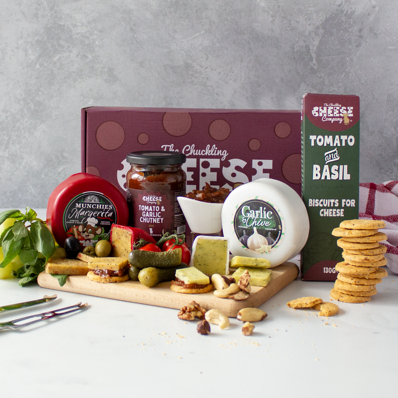 Garlic & Chive Cheese Truckle with stacked Tomato & Basil biscuits and chutney