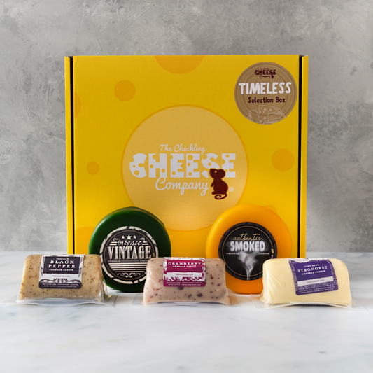 Timeless Selection Box with Intense Vintage Cheddar, Authentic Smoked Cheddar, Black Pepper Cheddar, Cranberry Cheddar and Strongest Cheddar.