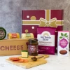 Cheese hampers as the perfect corporate gift Blog. Blog main image of the Garden Cheese Hamper open with cheese and accompaniments presented on a cheeseboard