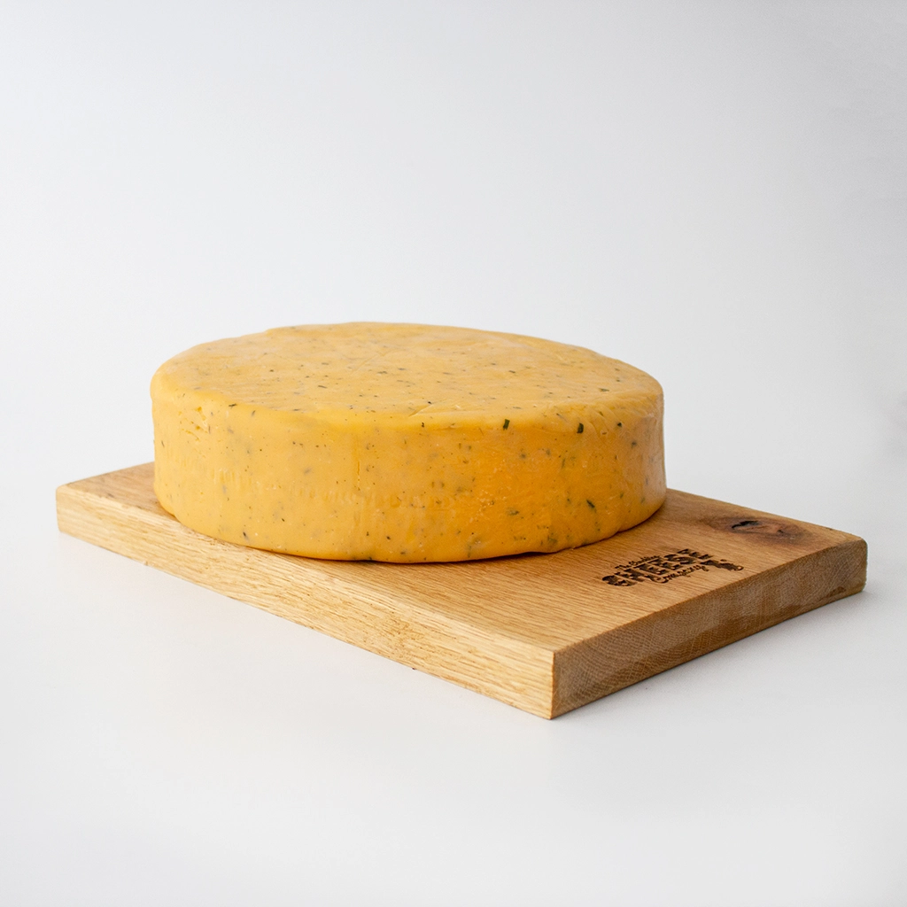 https://www.chucklingcheese.co.uk/images/blog_article/source/What%20is%20a%20cheese%20wheel.webp?t=1683199780