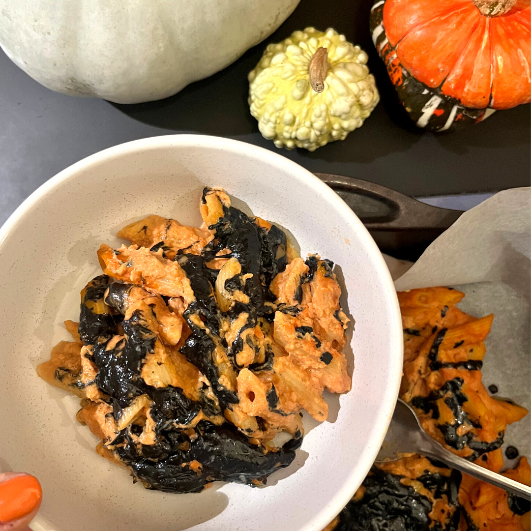 Over head image of a bowl of Cheesy Pumpkin Pasta Bake
