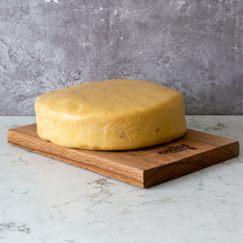 2.25kg Caramelised Red Onion Cheddar Wheel Available to Shop at The Chuckling Cheese Company