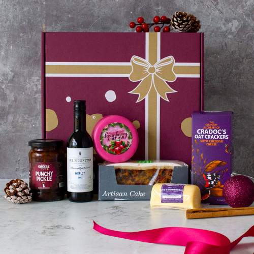 An image of the Cheese and wine hamper availble to purchase from the chuckling cheese company