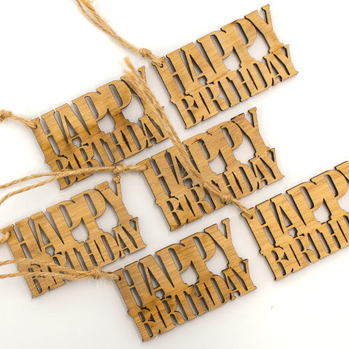 A close up image of a 6 pack of Happy Birthday Wooden Gift Toppers