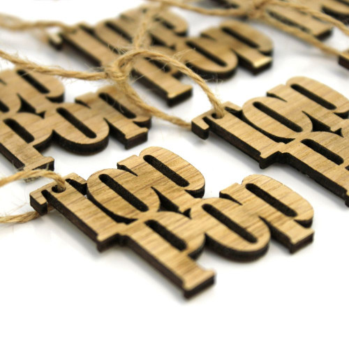 A close up image of the top pop wooden gift tags by The Chuckling Cheese Company.