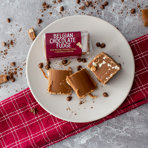 Lifestyle image of single bar of Belgian Chocolate Fudge sprinkled with chocolate chips