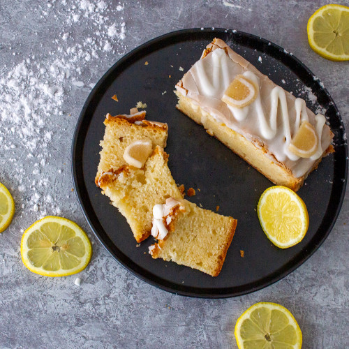 An image of the Lemon Drizzle Midi Loaf Cake avaible to purchase from The Chuckling Cheese Company