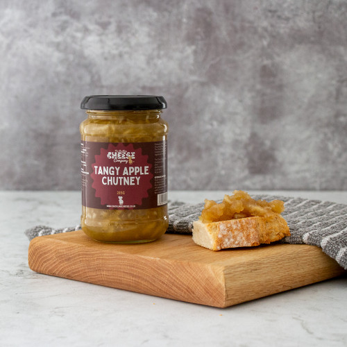 Lifestyle product shot of Tangy Apple Chutney by The Chuckling Cheese Company