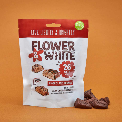 A photo of a bag of Flower and White Chocolate Meringue Bites.