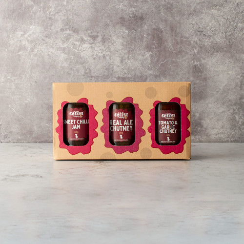 Grey background image of the Chutney Gift Pack 2 including three flavoursome chutneys real ale chutney, tomato and garlic chutney, and sweet chilli jam