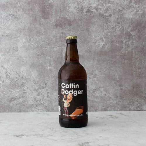 Grey background image product shot of the Coffin Dodger Comedy Beer