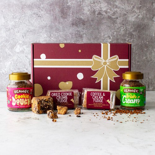 Grey background image of the cookies and cream gift box including two jars of beanies coffee and two fudge bars
