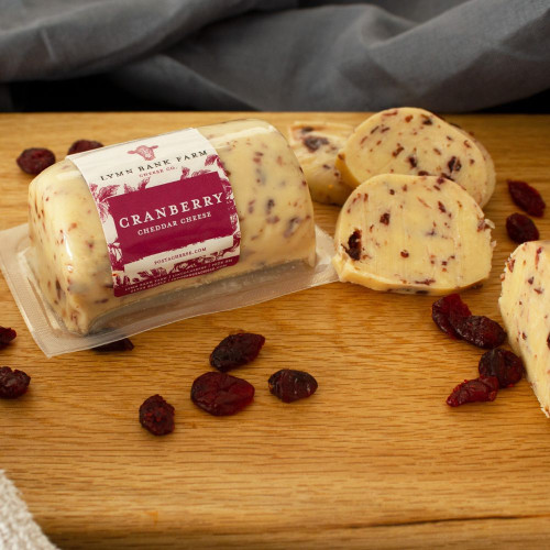 Lifestyle image of the Cranberry Cheddar Cheese Barrel.